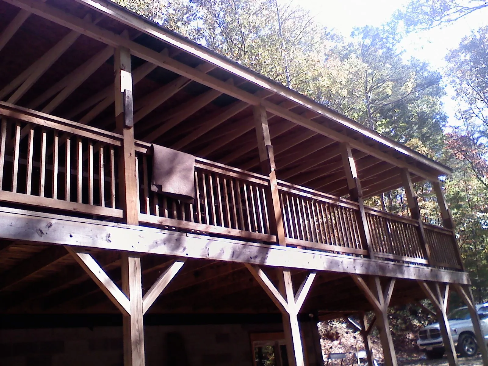 Timber framing under a new elevated porch and deck — Roof Leak Repair in Forney by Roofing Brothers